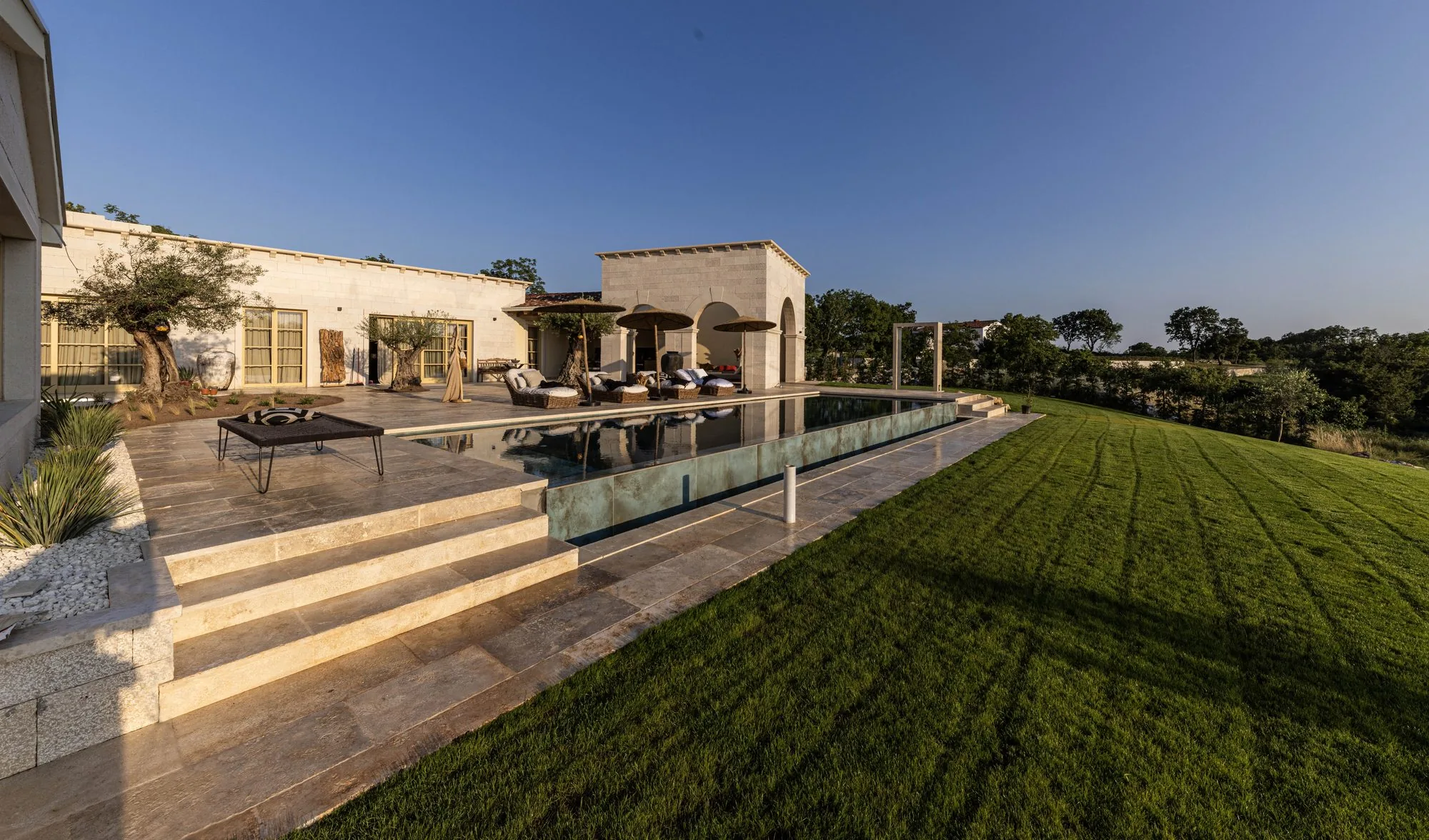 The residence and pool at LaMaison across the grounds, inland Istria