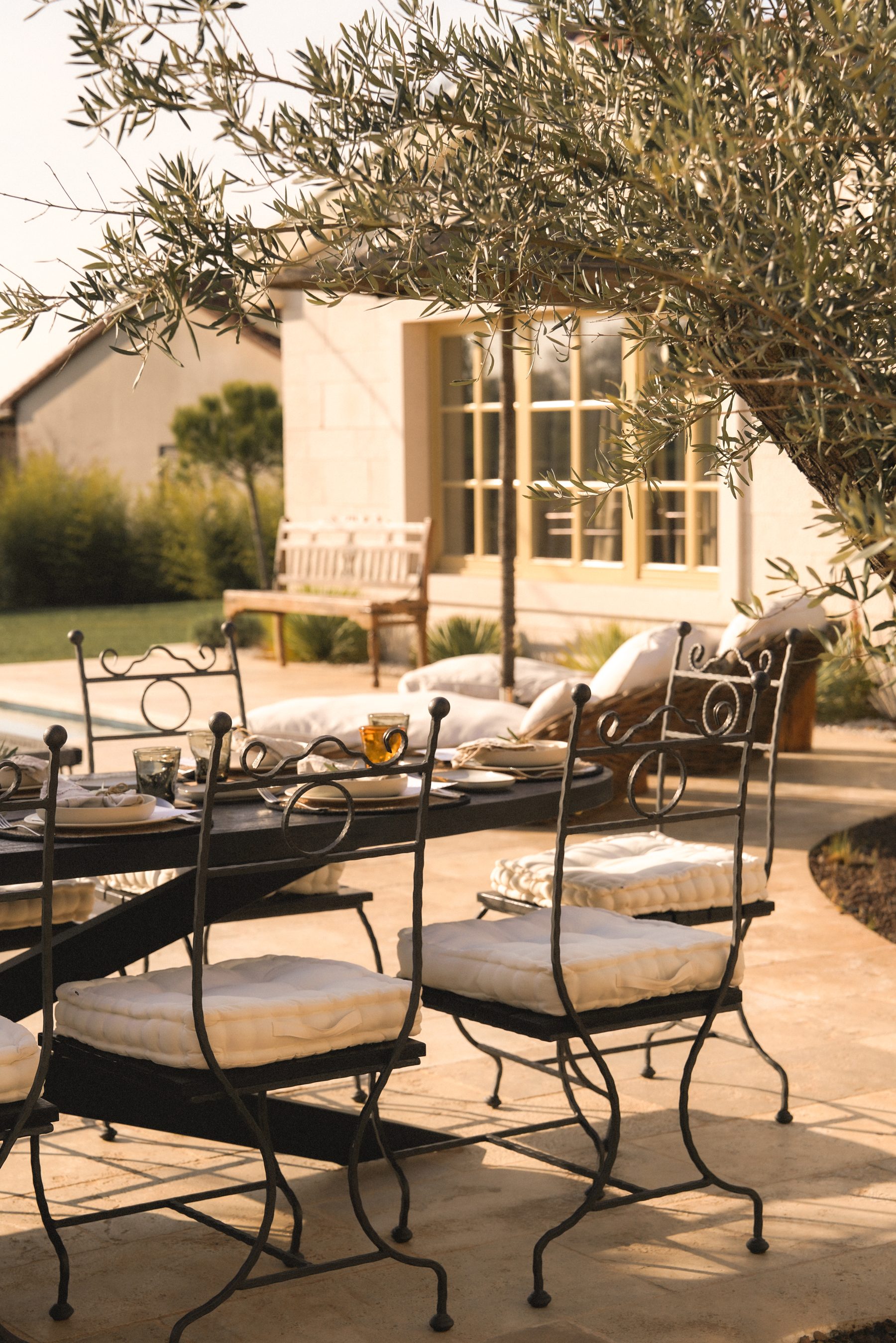 The terrace and olive tree at LaMaison