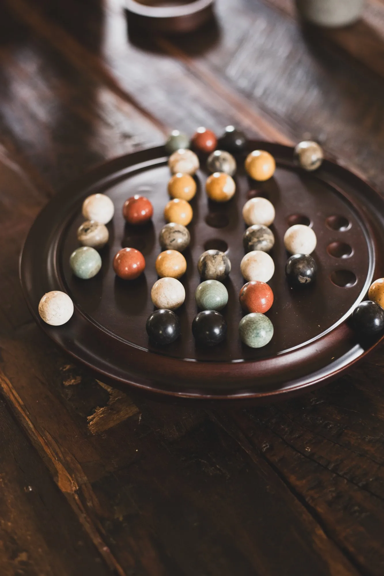 A wooden board game on a table at LaMaison