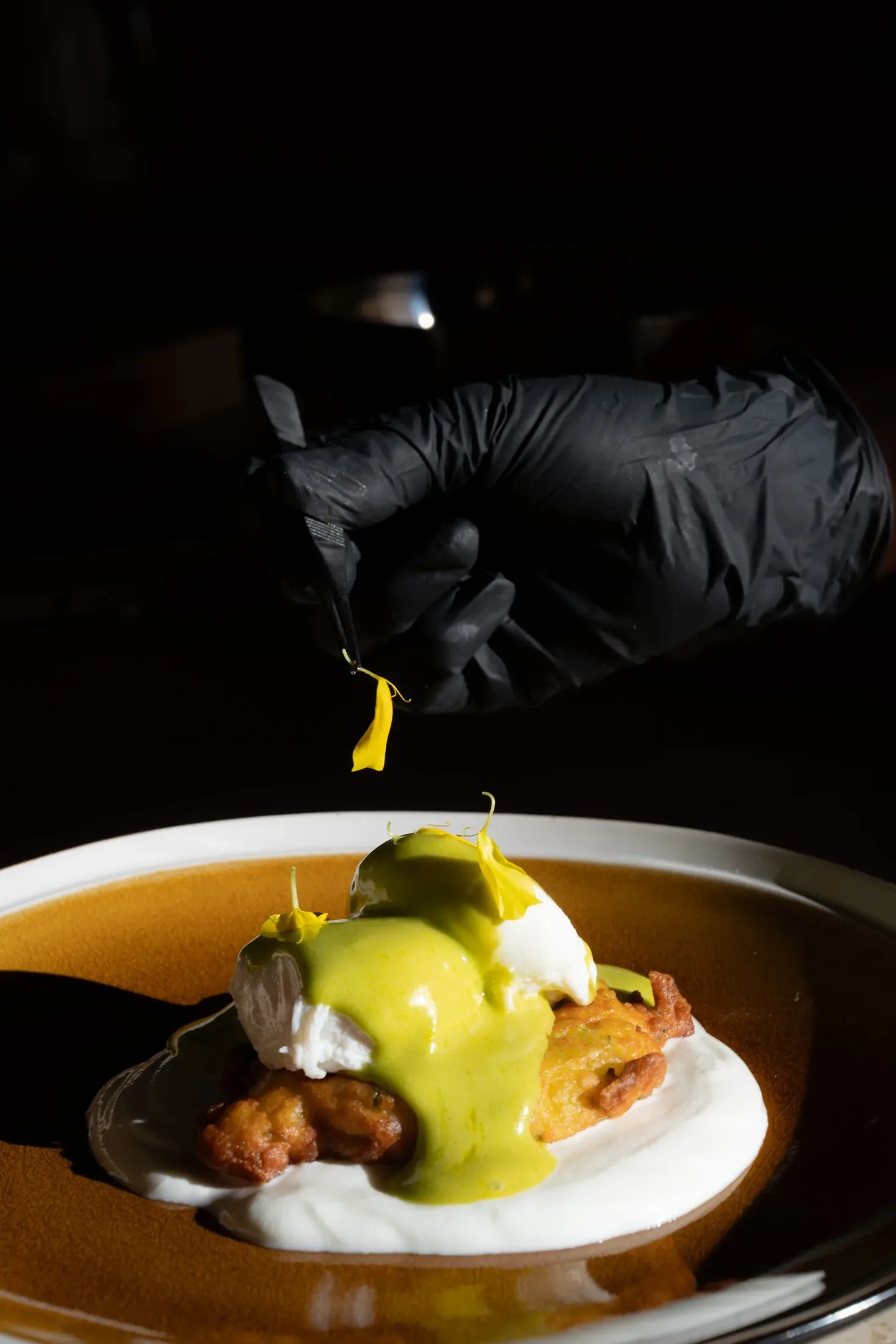 Eggs Benedict, the LaMaison way, plated by the chef