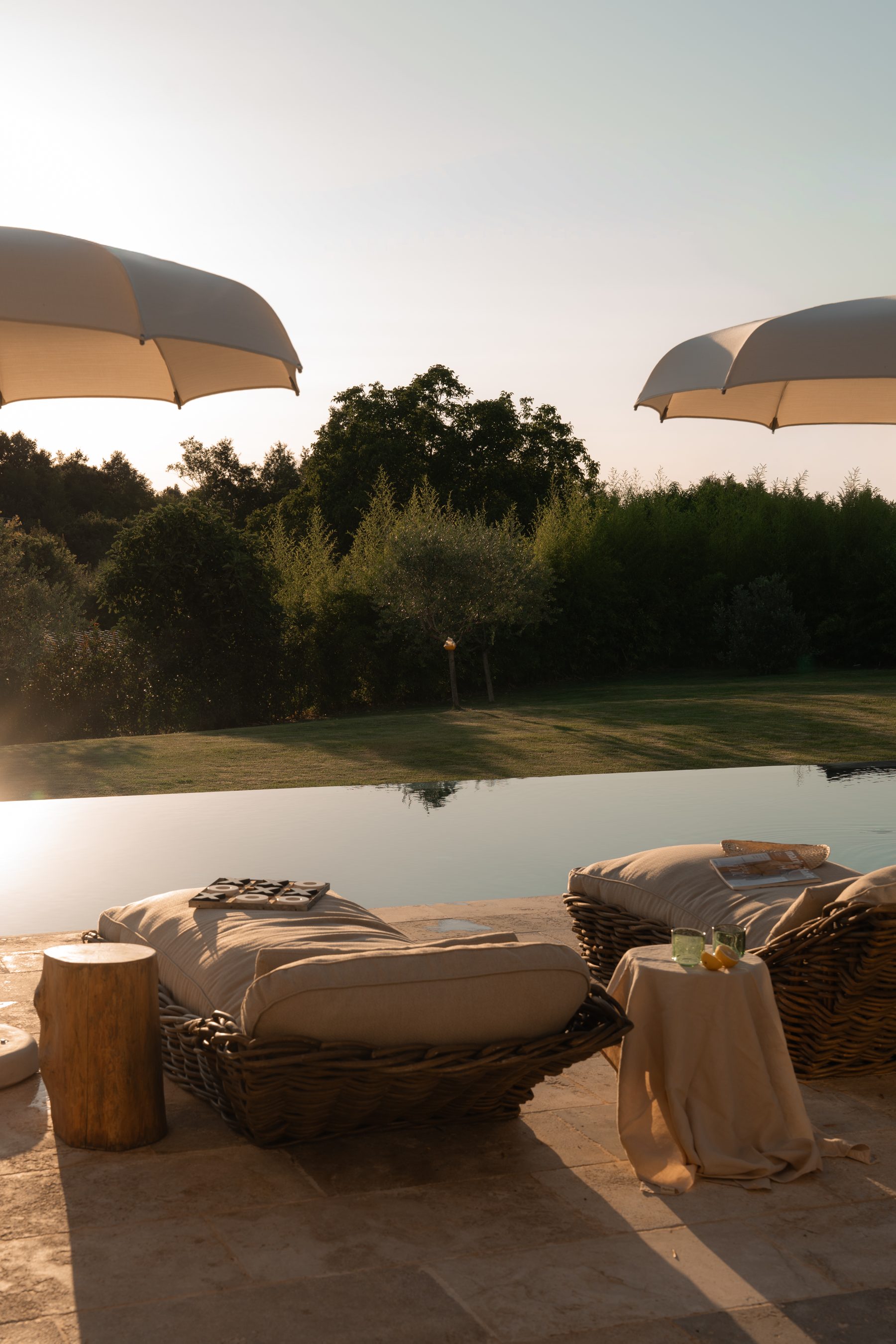 Loungers by the salty pool at LaMaison in the morning light